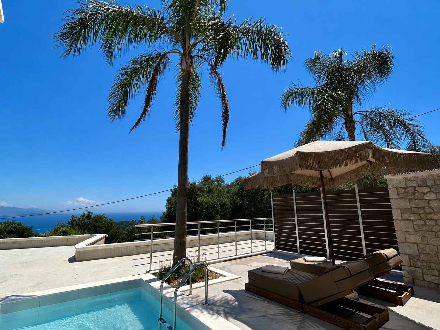 Superior Suite pool terrace with panoramic sea view